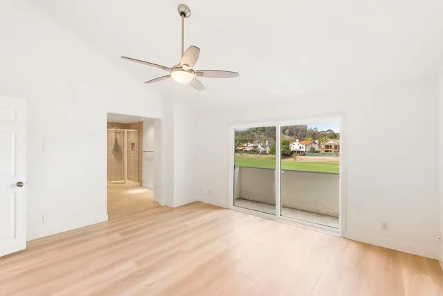 a view of building with outdoor space and river