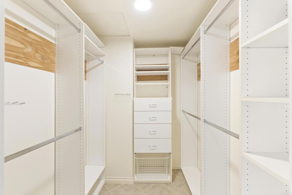 219 Via Osuna Rancho Santa Fe, CA 92091 - Photo 32 of 50 a view of walk in closet with empty racks