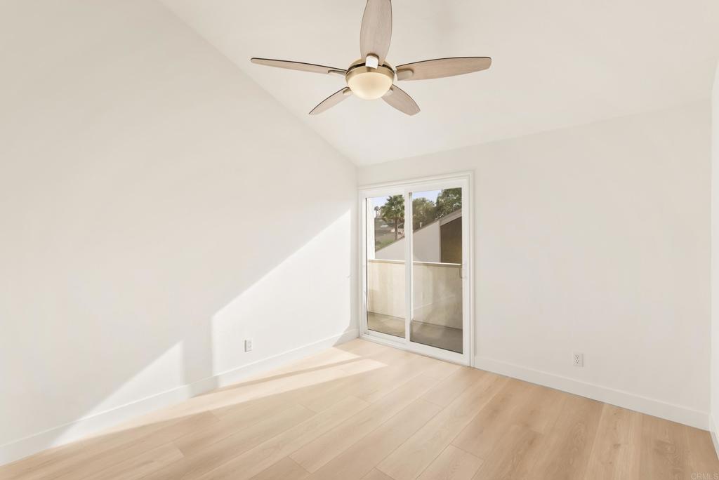 219 Via Osuna Rancho Santa Fe, CA 92091 - Photo 33 of 50 an empty room with windows and fan