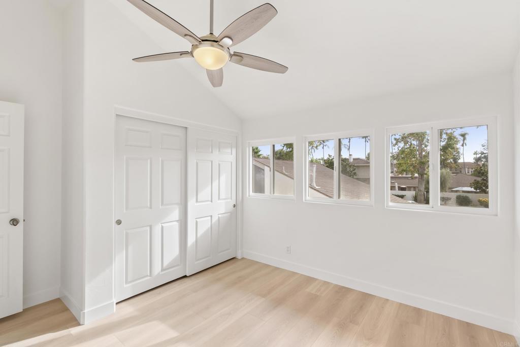 219 Via Osuna Rancho Santa Fe, CA 92091 - Photo 37 of 50 an empty room with chandelier fan