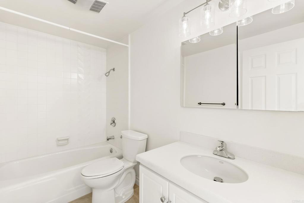 219 Via Osuna Rancho Santa Fe, CA 92091 - Photo 38 of 50 a bathroom with a sink toilet and shower