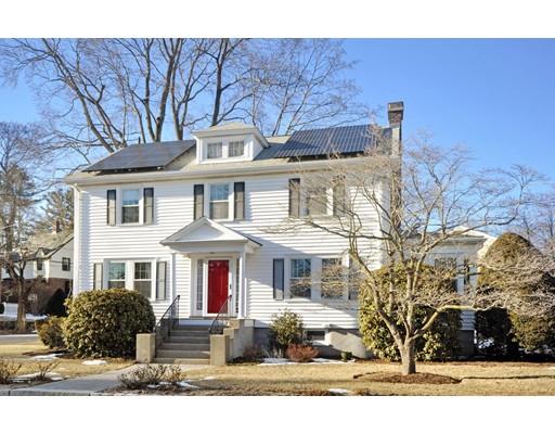 39 Upland Road Arlington, MA 02474 - Photo 1 of 30 a front view of a house with garden
