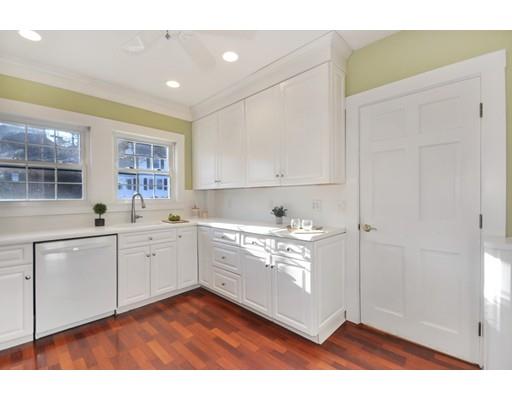 39 Upland Road Arlington, MA 02474 - Photo 18 of 30 a kitchen with appliances cabinets and a sink