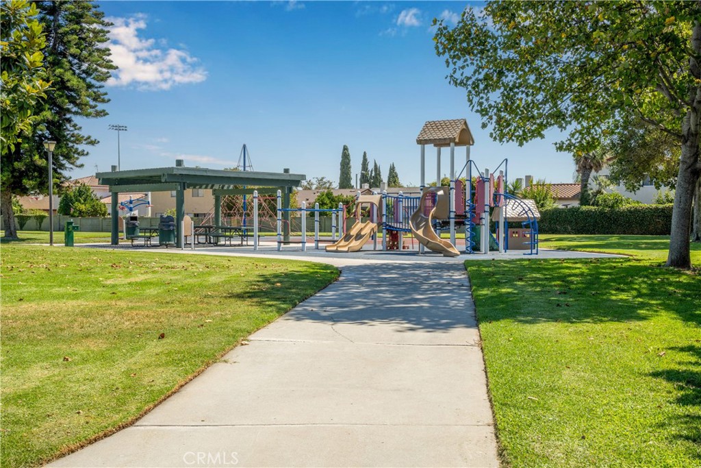 4237 Larwin Avenue Cypress, CA 90630 - Photo 39 of 48 a front view of a building with a garden