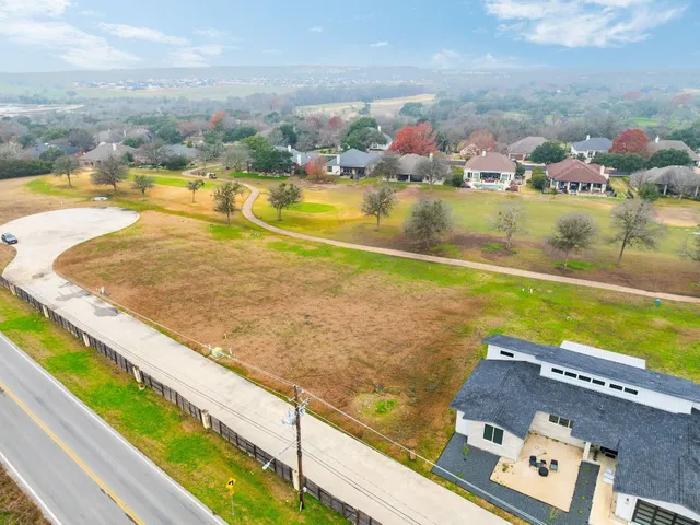 a view of a swimming pool with a lake view