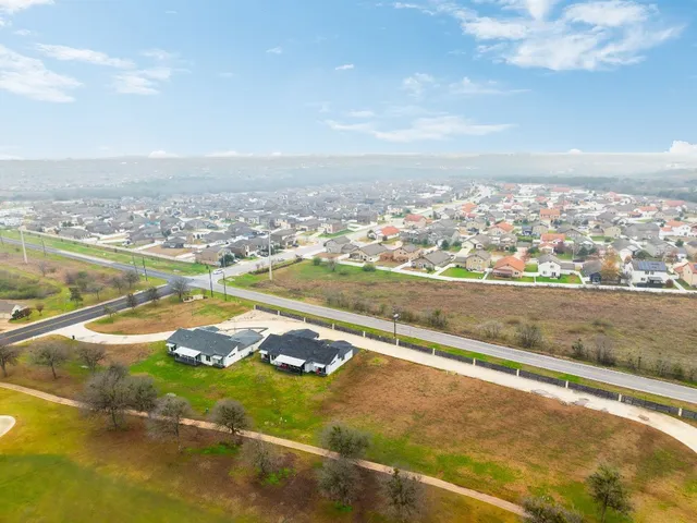 a view of a lake with a city