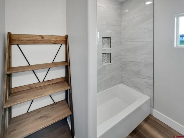 a bathroom with a bathtub