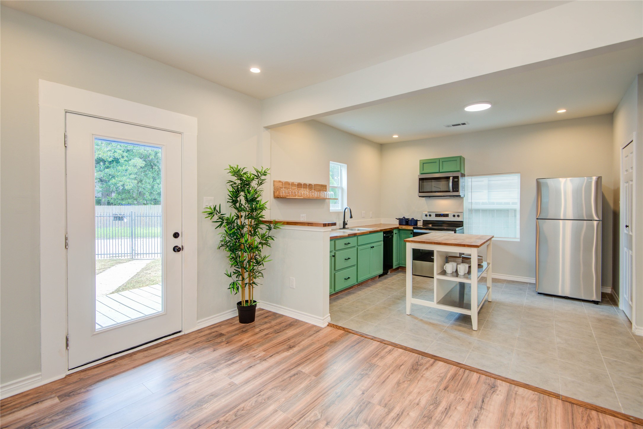 2712 Link Road Houston, TX 77009 - Photo 7 of 35 a kitchen with furniture and a refrigerator