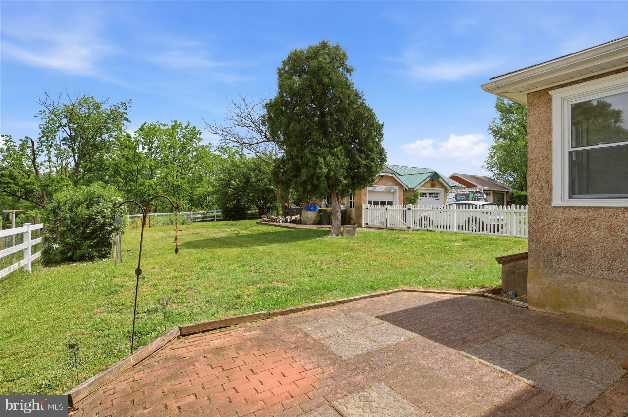 3131 Bedminster Road Ottsville, PA 18942 - Photo 21 of 23 a view of a house with backyard and trees