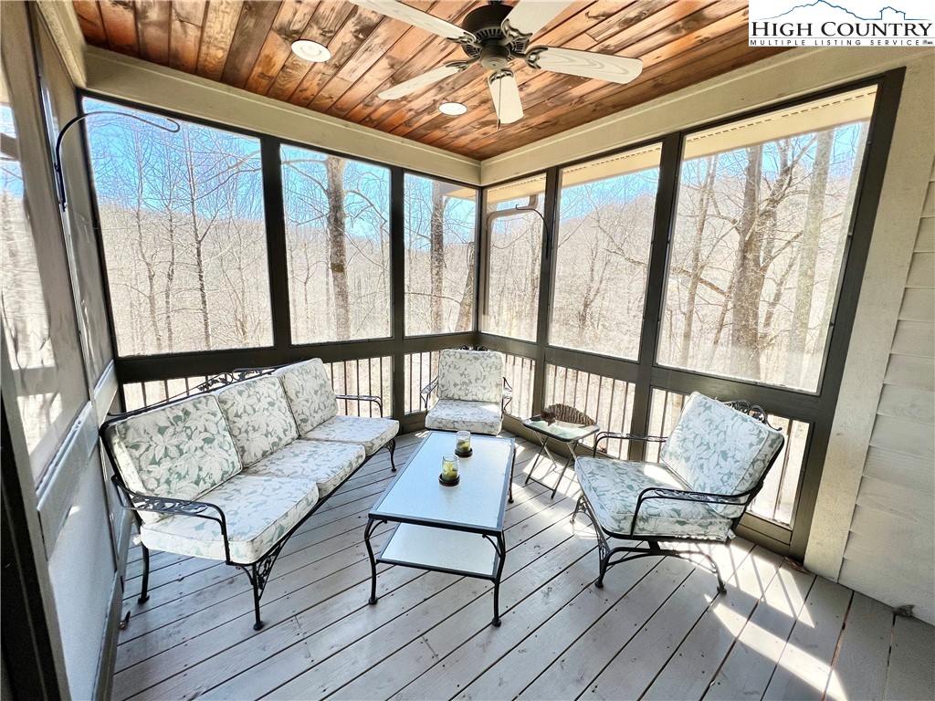 259 The Settlement Boone, NC 28607 - Photo 11 of 50 a living room with furniture and a large window