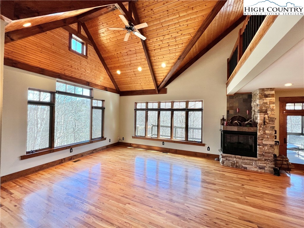 259 The Settlement Boone, NC 28607 - Photo 14 of 50 a view of an empty room with wooden floor and a window