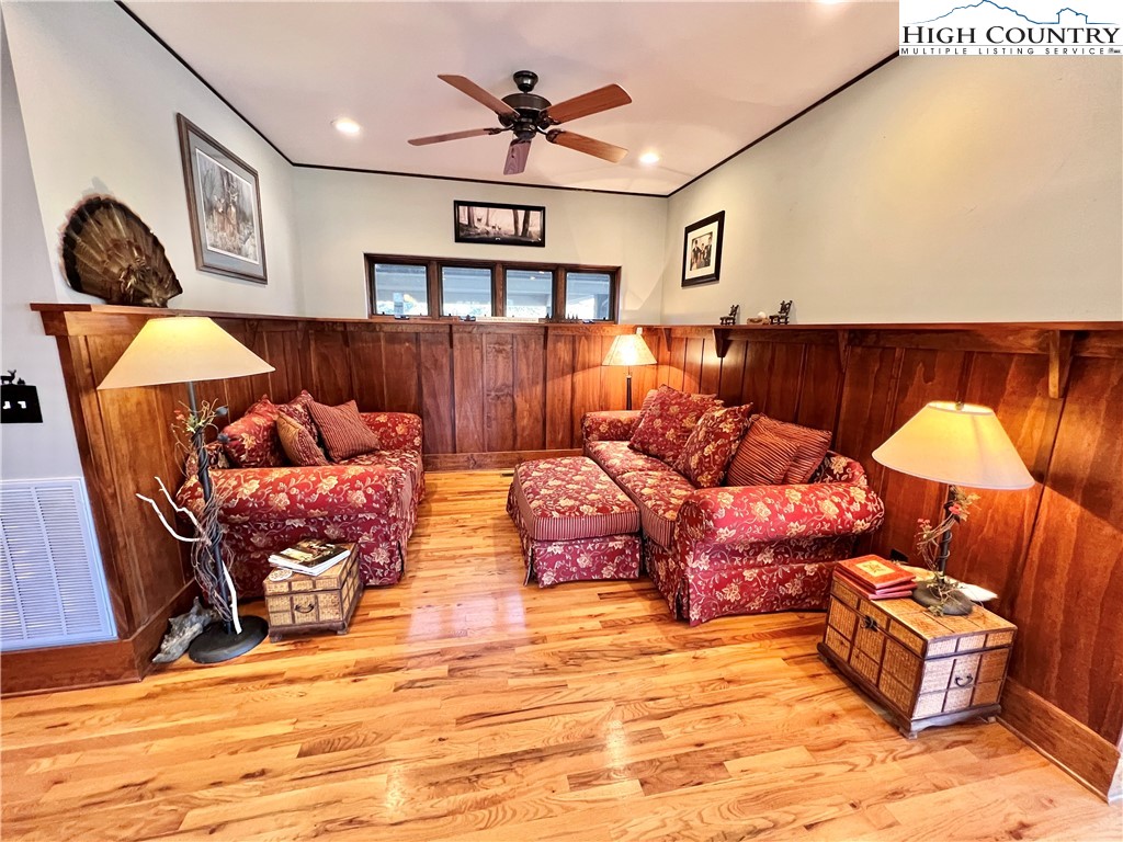 259 The Settlement Boone, NC 28607 - Photo 21 of 50 a living room with furniture a rug and lamp