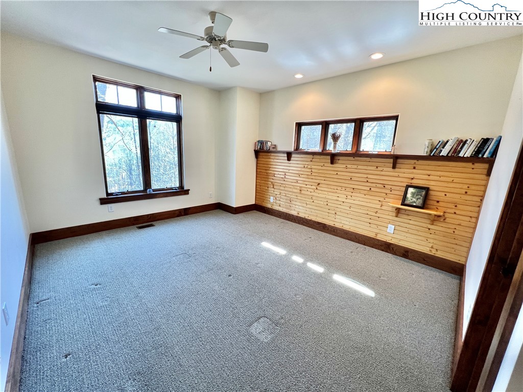259 The Settlement Boone, NC 28607 - Photo 26 of 50 a view of an empty room with window and mirror