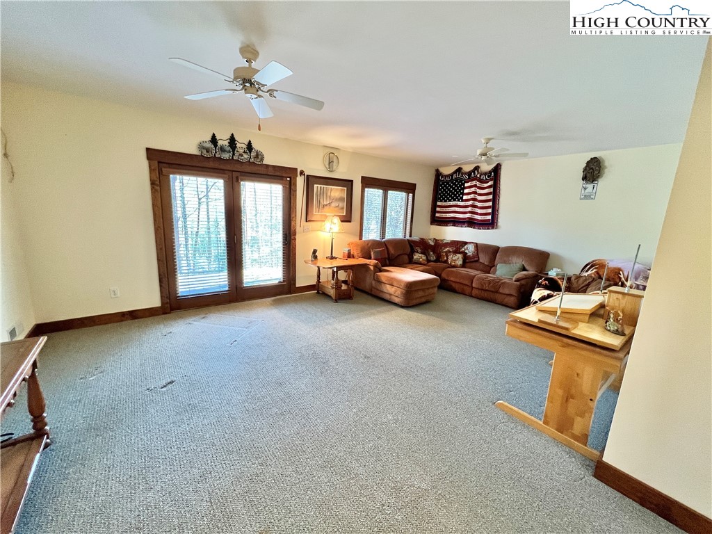 259 The Settlement Boone, NC 28607 - Photo 38 of 50 a living room with furniture and a window