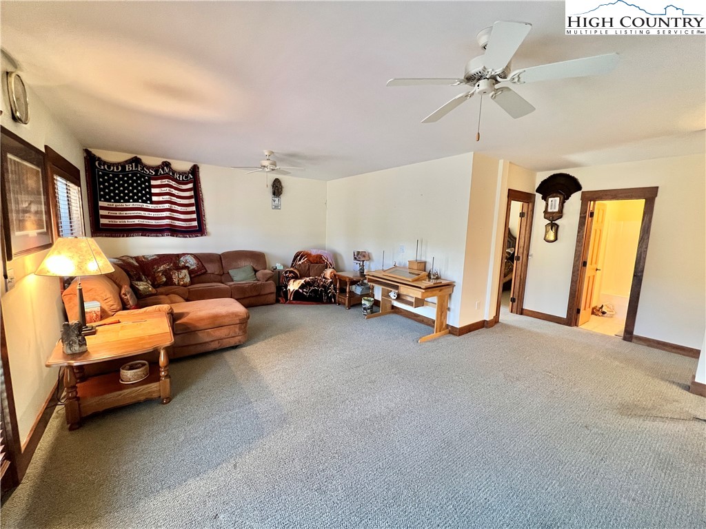 259 The Settlement Boone, NC 28607 - Photo 39 of 50 a view of a livingroom with furniture a ceiling fan