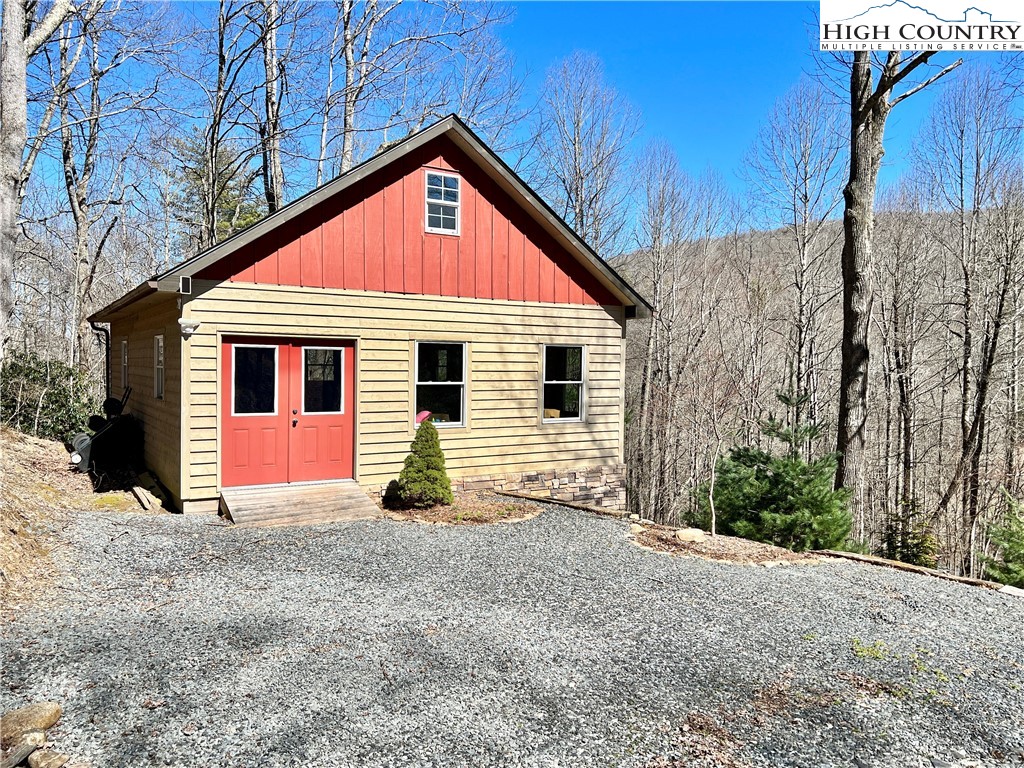 259 The Settlement Boone, NC 28607 - Photo 45 of 50 a view of a house with a yard