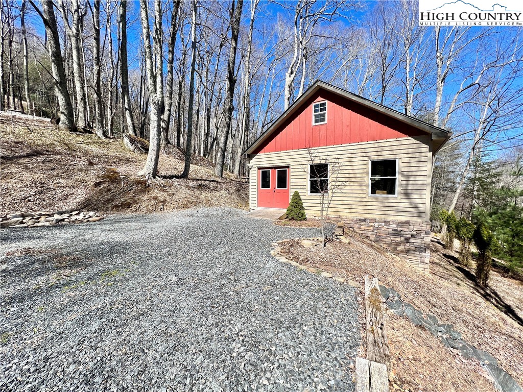 259 The Settlement Boone, NC 28607 - Photo 46 of 50 a view of a house with a yard