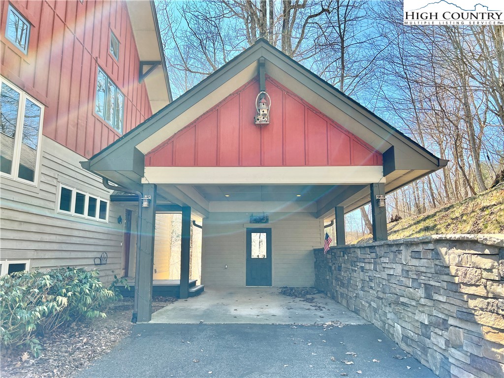259 The Settlement Boone, NC 28607 - Photo 6 of 50 a view of a house with a yard