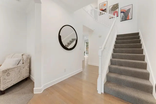 a view of entryway with stairs and furniture