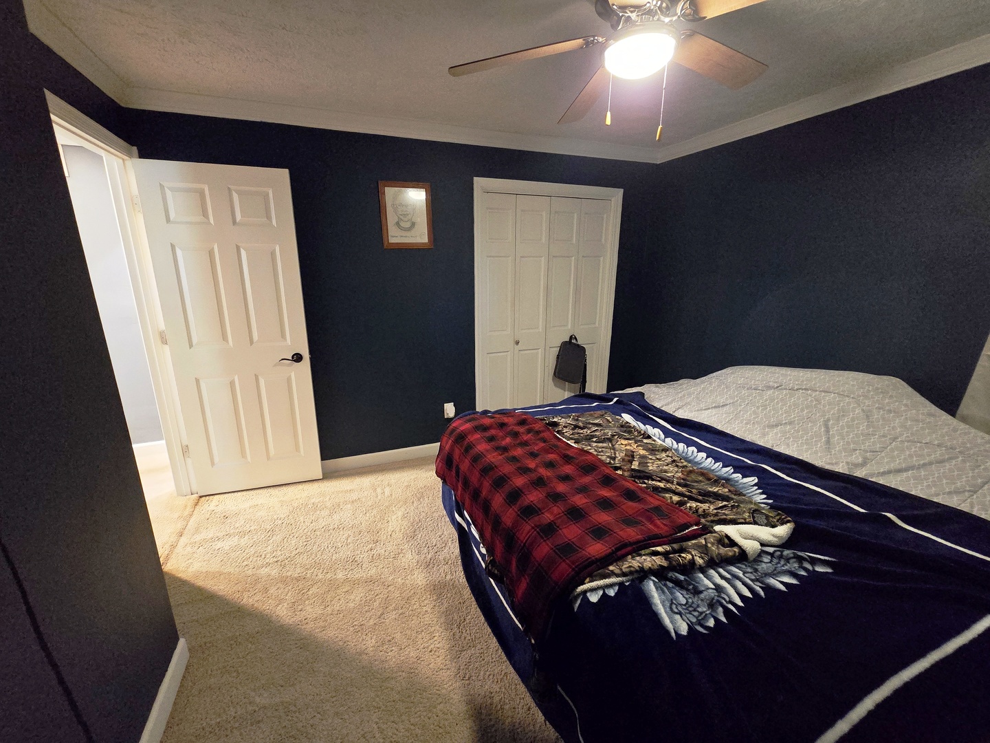 602 North 4th Avenue Chenoa, IL 61726 - Photo 11 of 38 a bedroom with a bed and a mirror