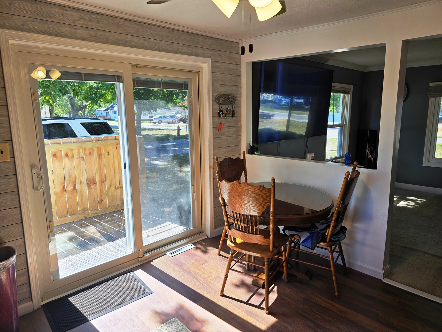 602 North 4th Avenue Chenoa, IL 61726 - Photo 9 of 38 a living room with furniture and a floor to ceiling window