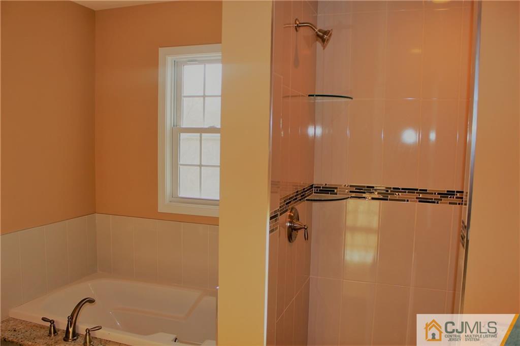 18 Richmond Road Edison, NJ 08817 - Photo 22 of 25 a bathroom with a shower