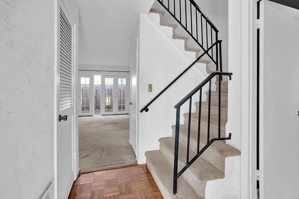 3312 Northcrest Road, Unit C Atlanta, GA 30340 - Photo 12 of 29 a view of staircase with railing and white walls