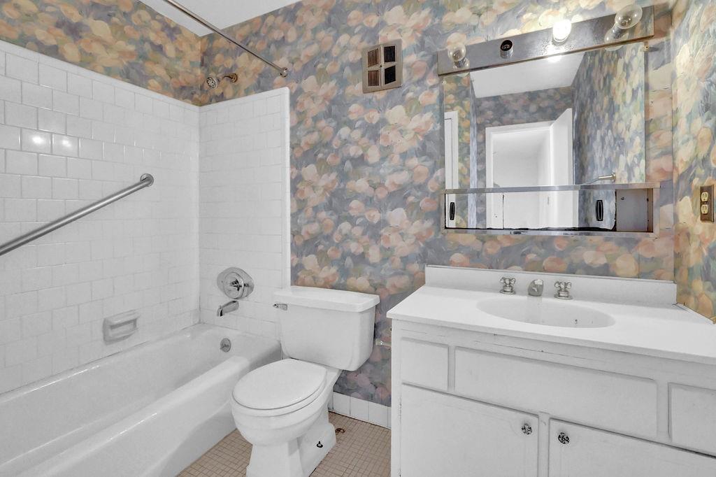 3312 Northcrest Road, Unit C Atlanta, GA 30340 - Photo 23 of 29 a bathroom with a sink toilet and shower