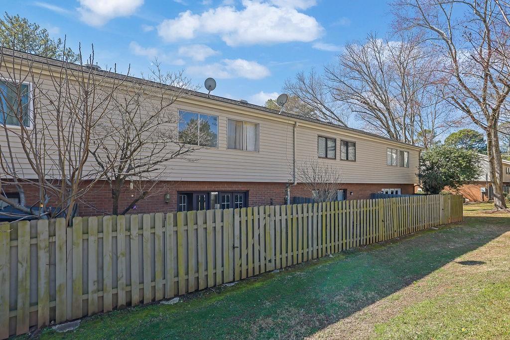 3312 Northcrest Road, Unit C Atlanta, GA 30340 - Photo 29 of 29 a view of a house with a small yard and wooden fence