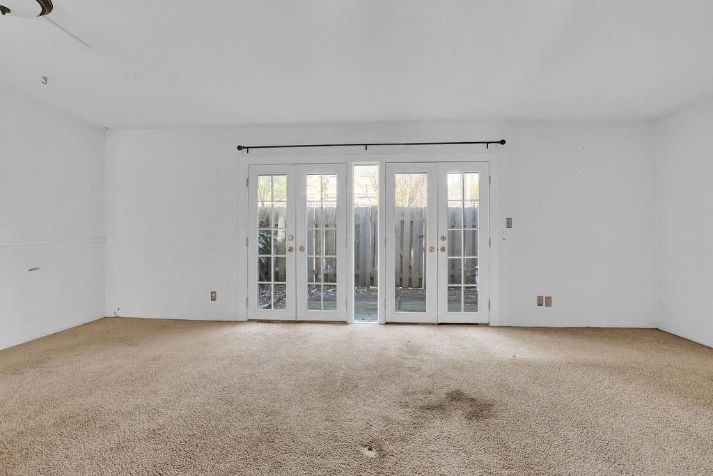 3312 Northcrest Road, Unit C Atlanta, GA 30340 - Photo 4 of 29 a view of an empty room with a window