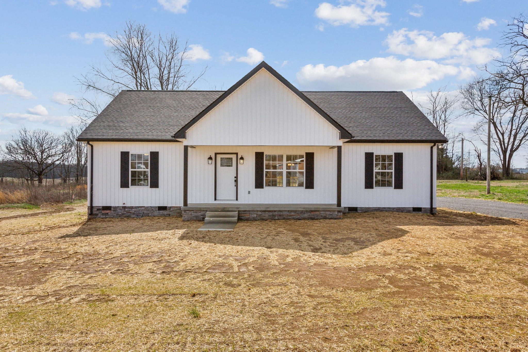 812 Days Road Lafayette, TN 37083 - Photo 1 of 25 a front view of a house with a yard