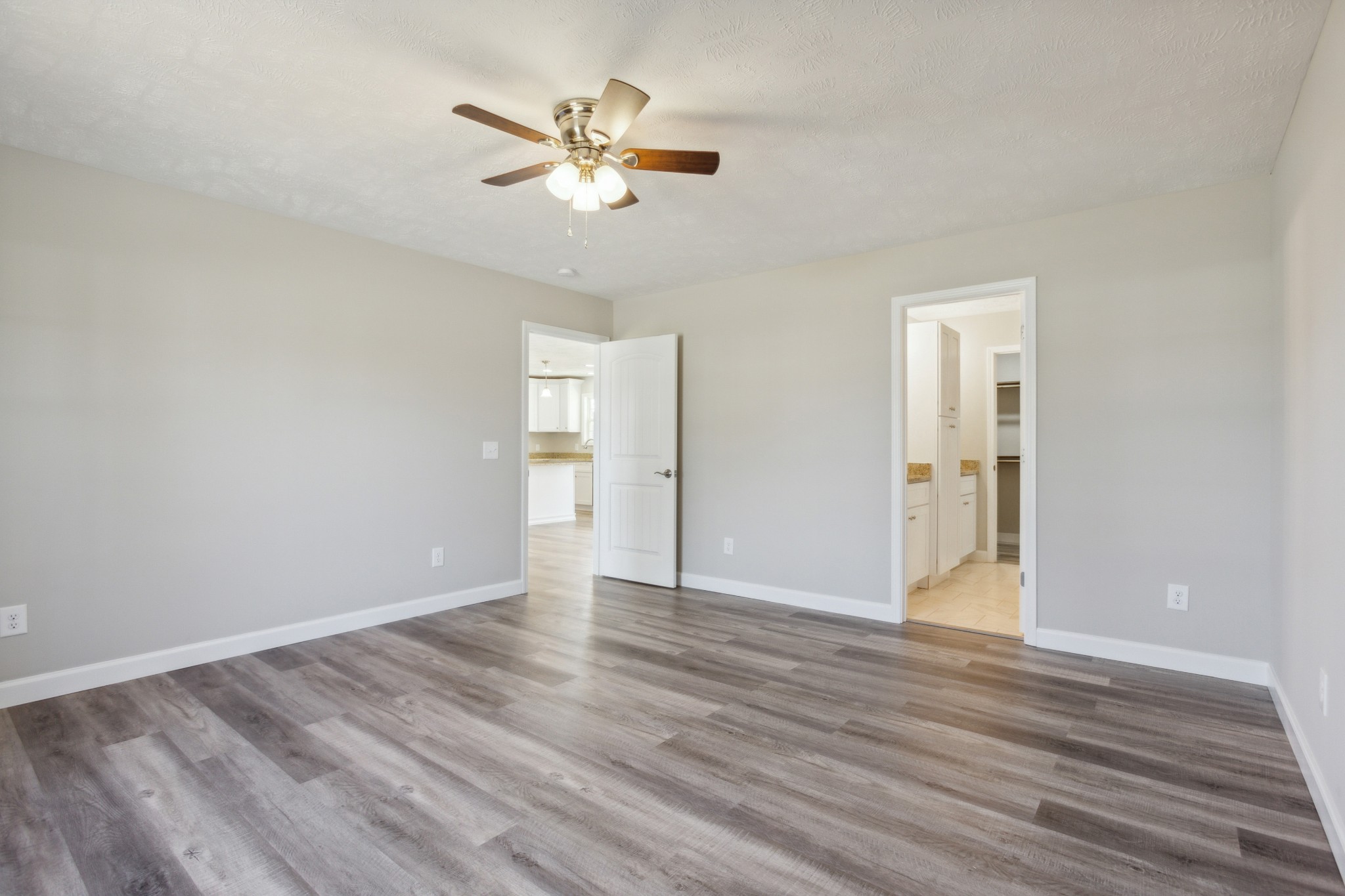 812 Days Road Lafayette, TN 37083 - Photo 14 of 25 a view of an empty room with wooden floor