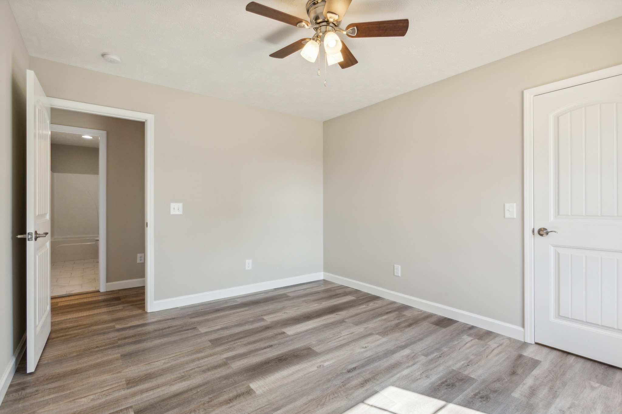812 Days Road Lafayette, TN 37083 - Photo 21 of 25 a view of an empty room with wooden floor