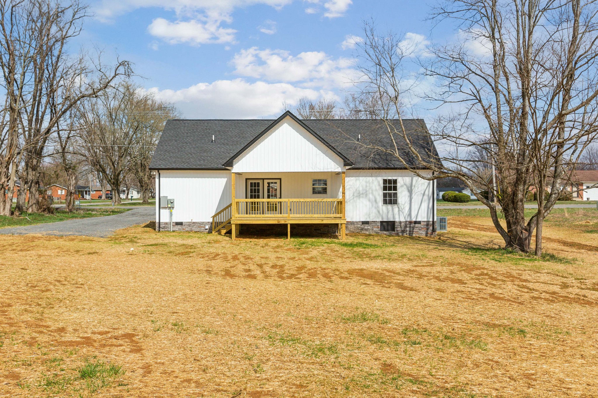 812 Days Road Lafayette, TN 37083 - Photo 25 of 25 a house with trees in front of it