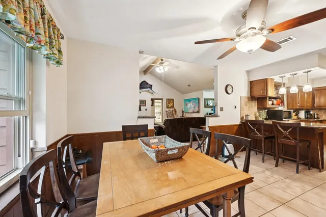a view of a dining room with furniture