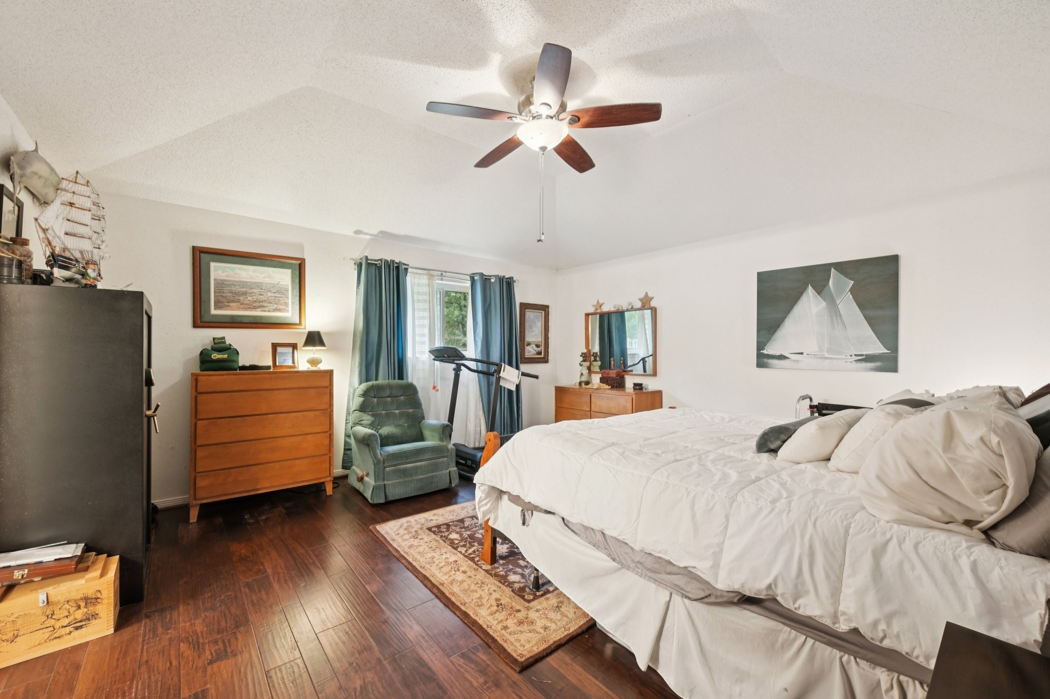 2007 Diane Street Pinehurst, TX 77362 - Photo 29 of 49 a bedroom with a bed and a chandelier
