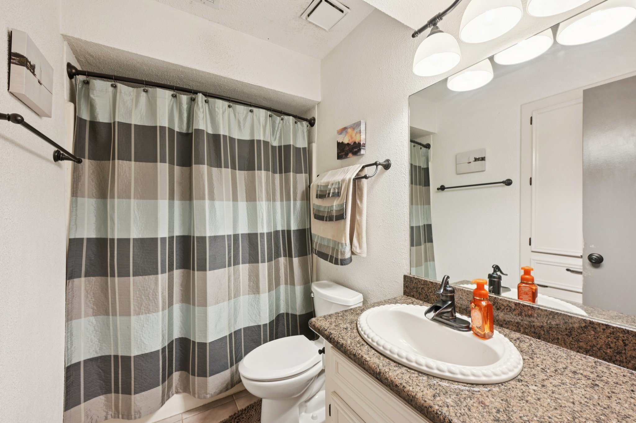 2007 Diane Street Pinehurst, TX 77362 - Photo 35 of 49 a bathroom with a sink toilet and shower