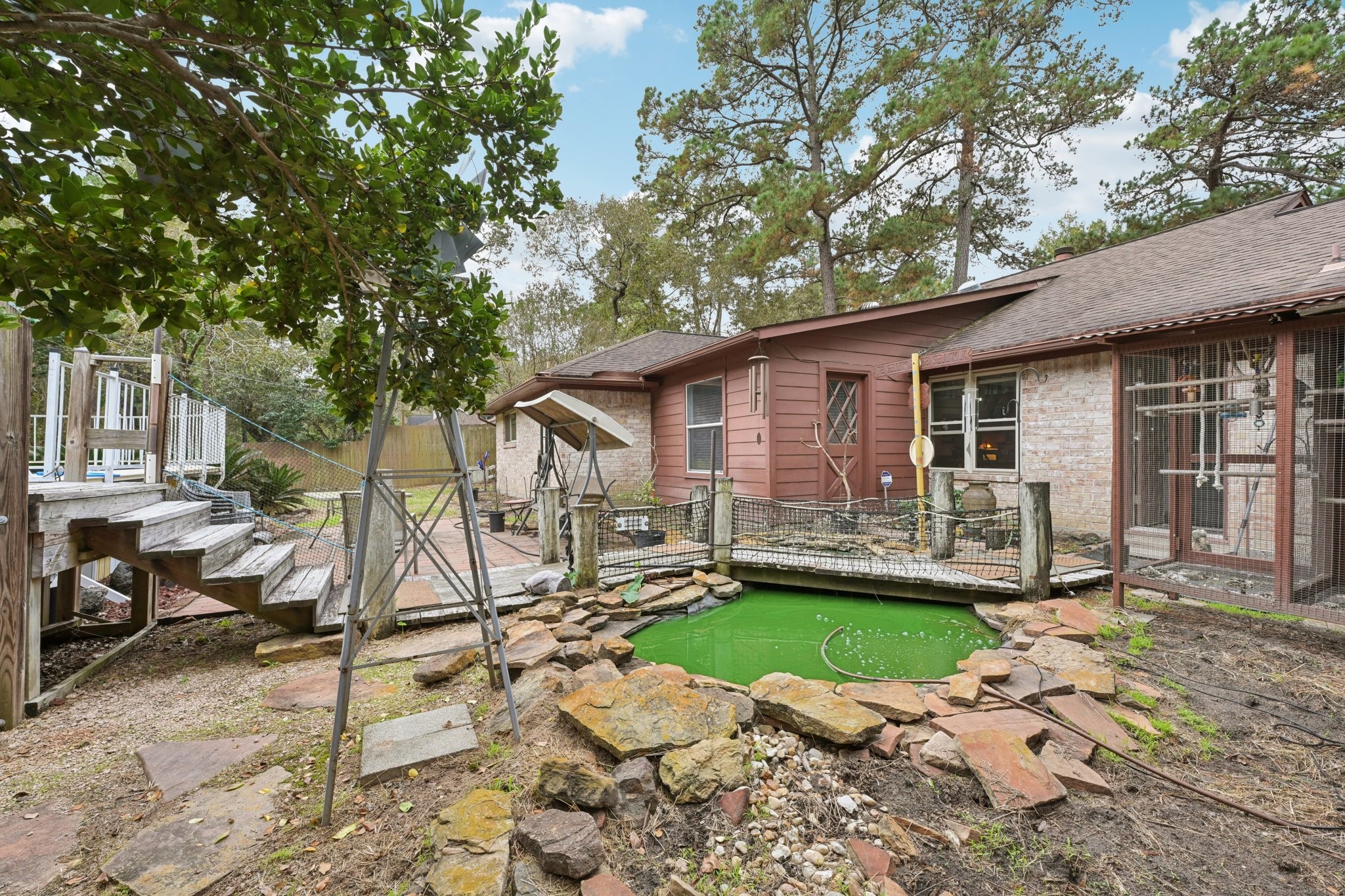 2007 Diane Street Pinehurst, TX 77362 - Photo 40 of 49 a view of a house with backyard