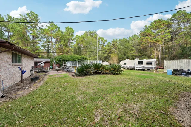 a view of a city with lush green forest