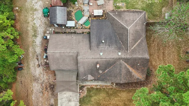 an aerial view of a highlighted house