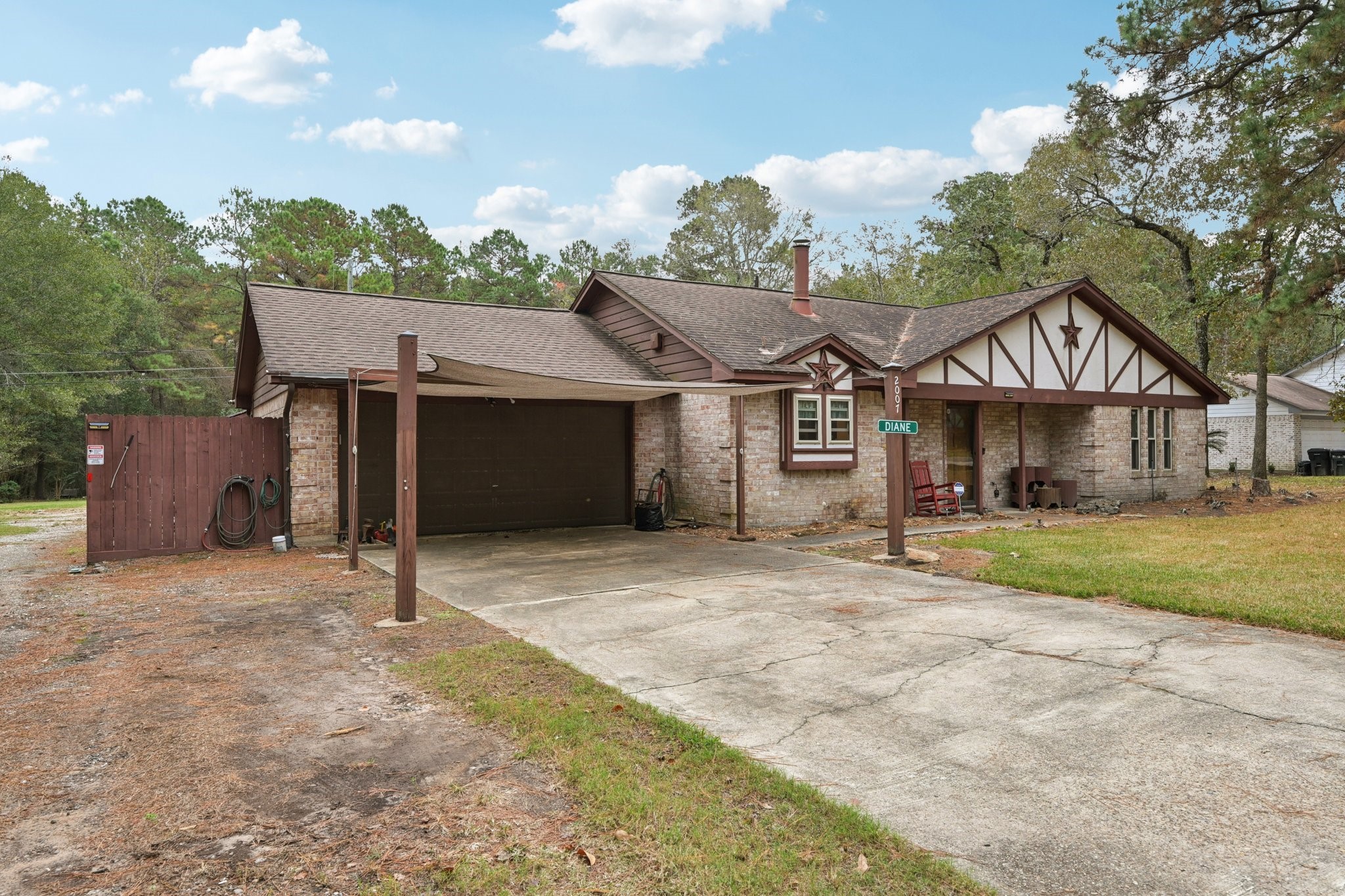 2007 Diane Street Pinehurst, TX 77362 - Photo 6 of 49 front view of a house with a yard