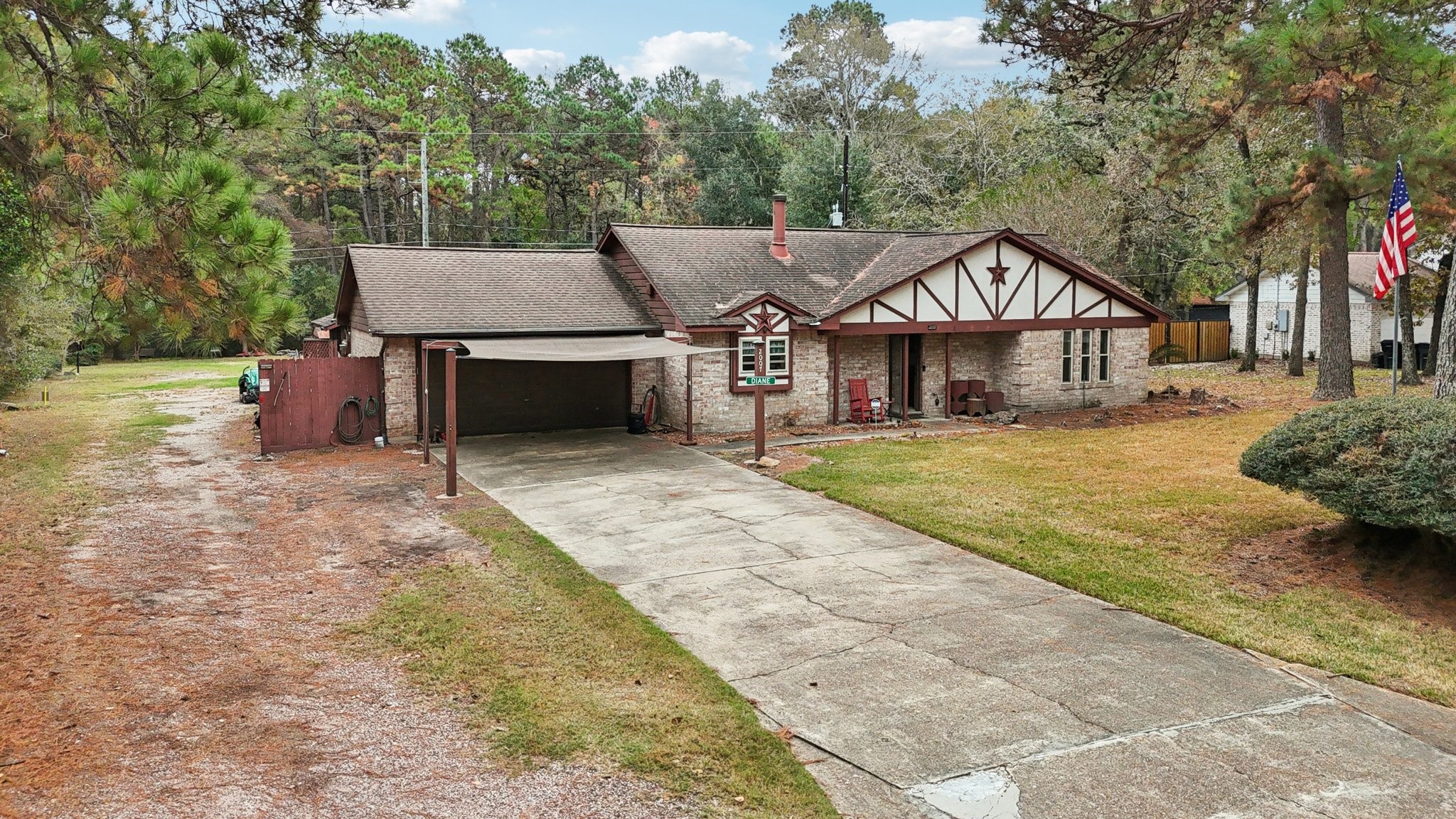 2007 Diane Street Pinehurst, TX 77362 - Photo 7 of 41 a view of a house with a yard