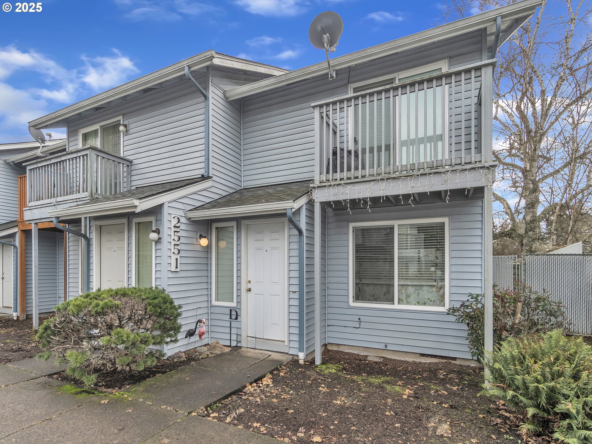 2551 Southwest Pickford Street, Unit D Corvallis, OR 97333 - Photo 1 of 25 a front view of a house with garden