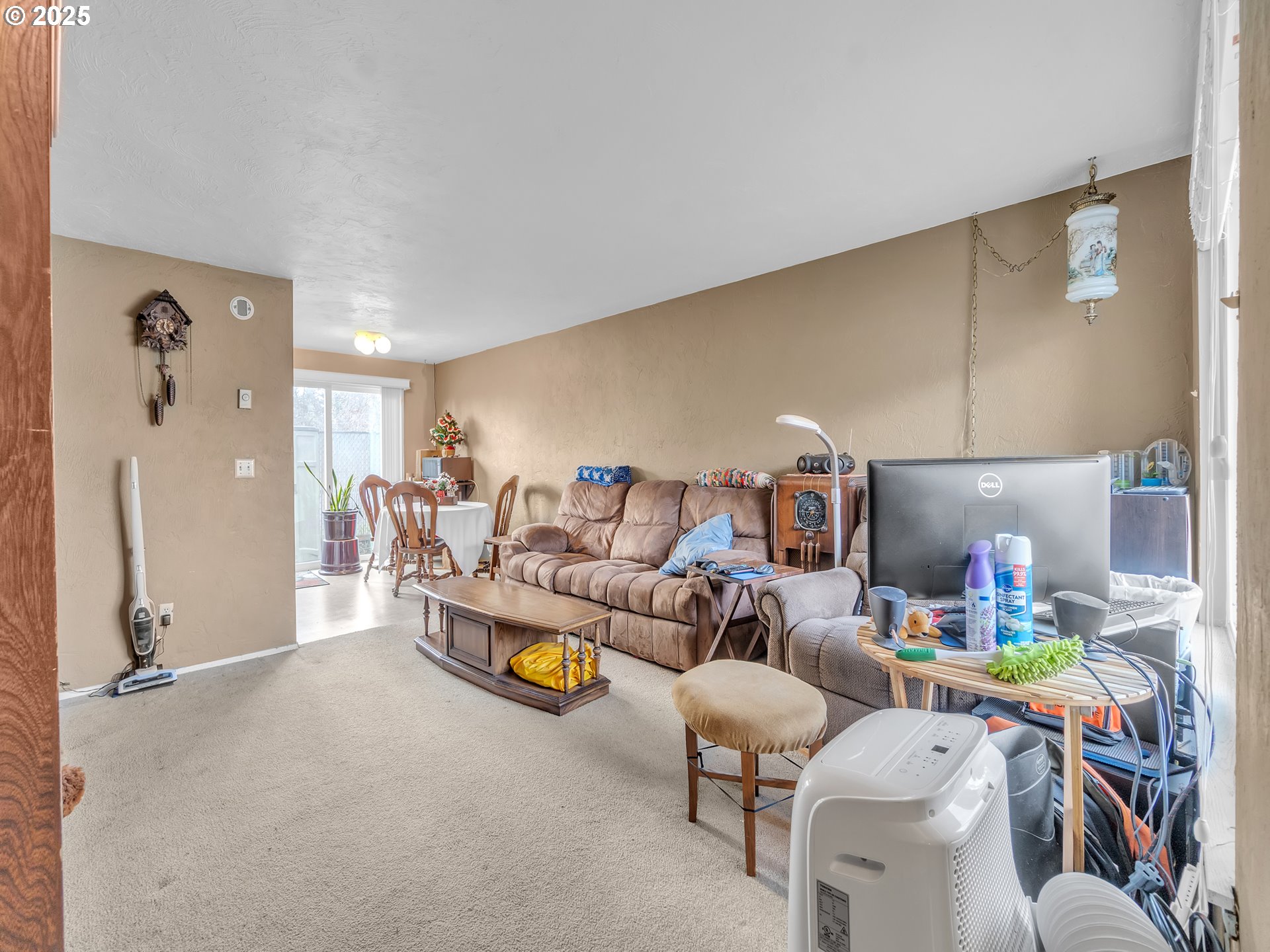 2551 Southwest Pickford Street, Unit D Corvallis, OR 97333 - Photo 13 of 25 a living room with lots of furniture and gym equipment