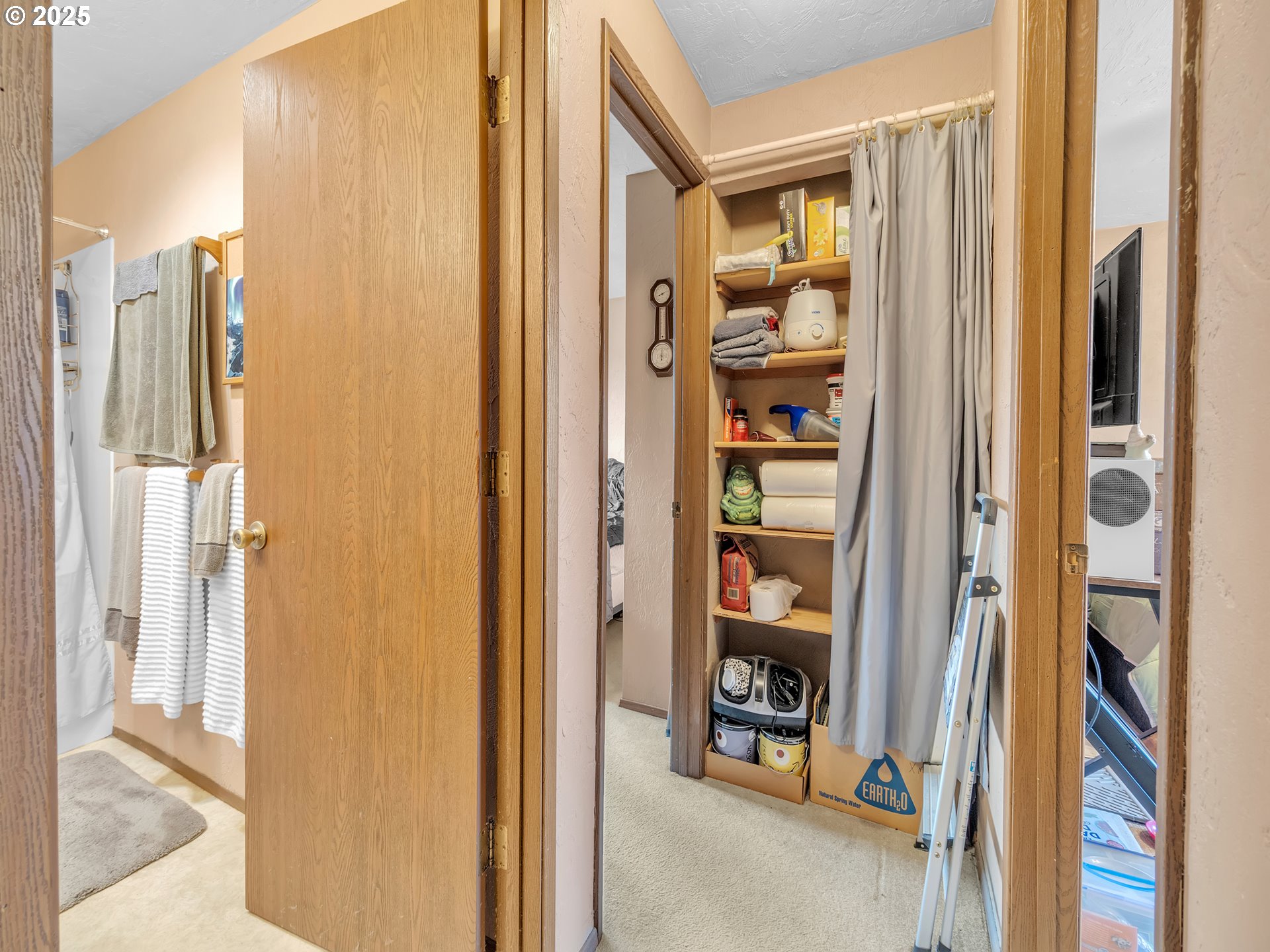 2551 Southwest Pickford Street, Unit D Corvallis, OR 97333 - Photo 16 of 25 a view of a hallway with wooden shelves