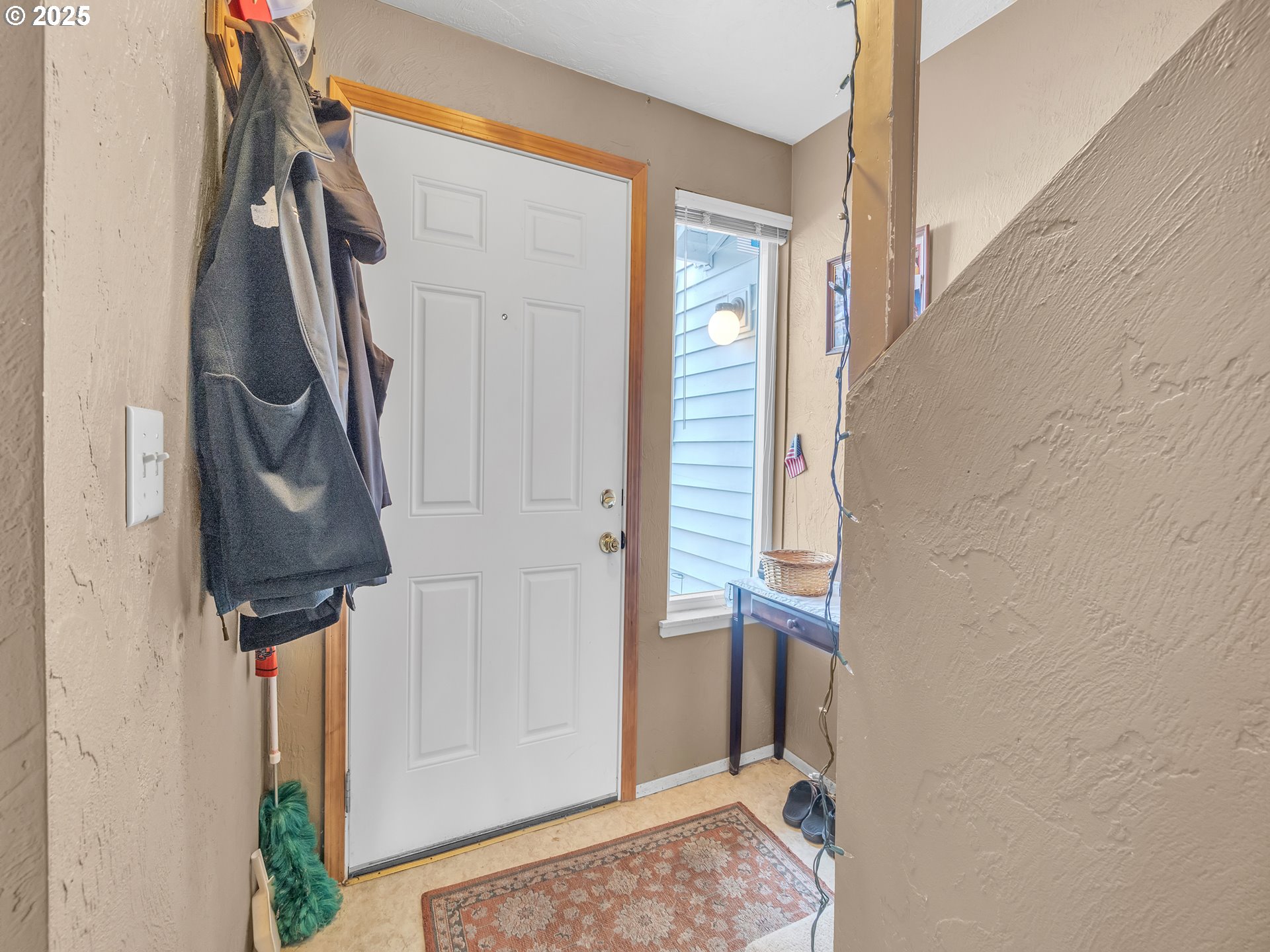 2551 Southwest Pickford Street, Unit D Corvallis, OR 97333 - Photo 6 of 25 a view of hallway with stairs and wooden floor