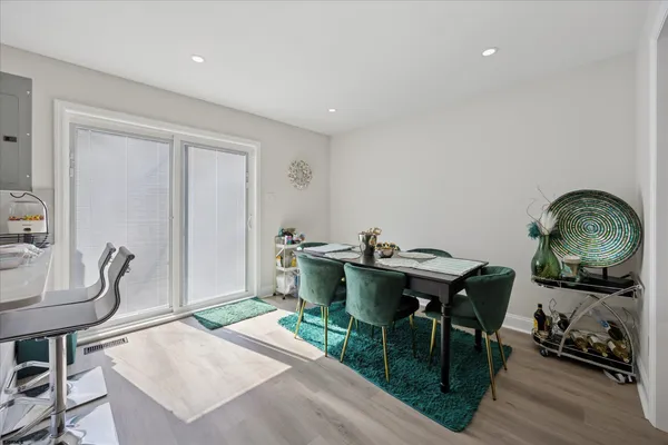 a workspace with furniture and wooden floor