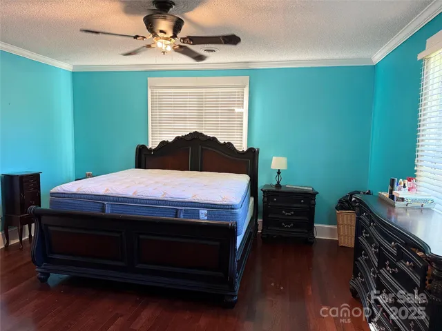 a bathroom with a sink vanity and a mirror
