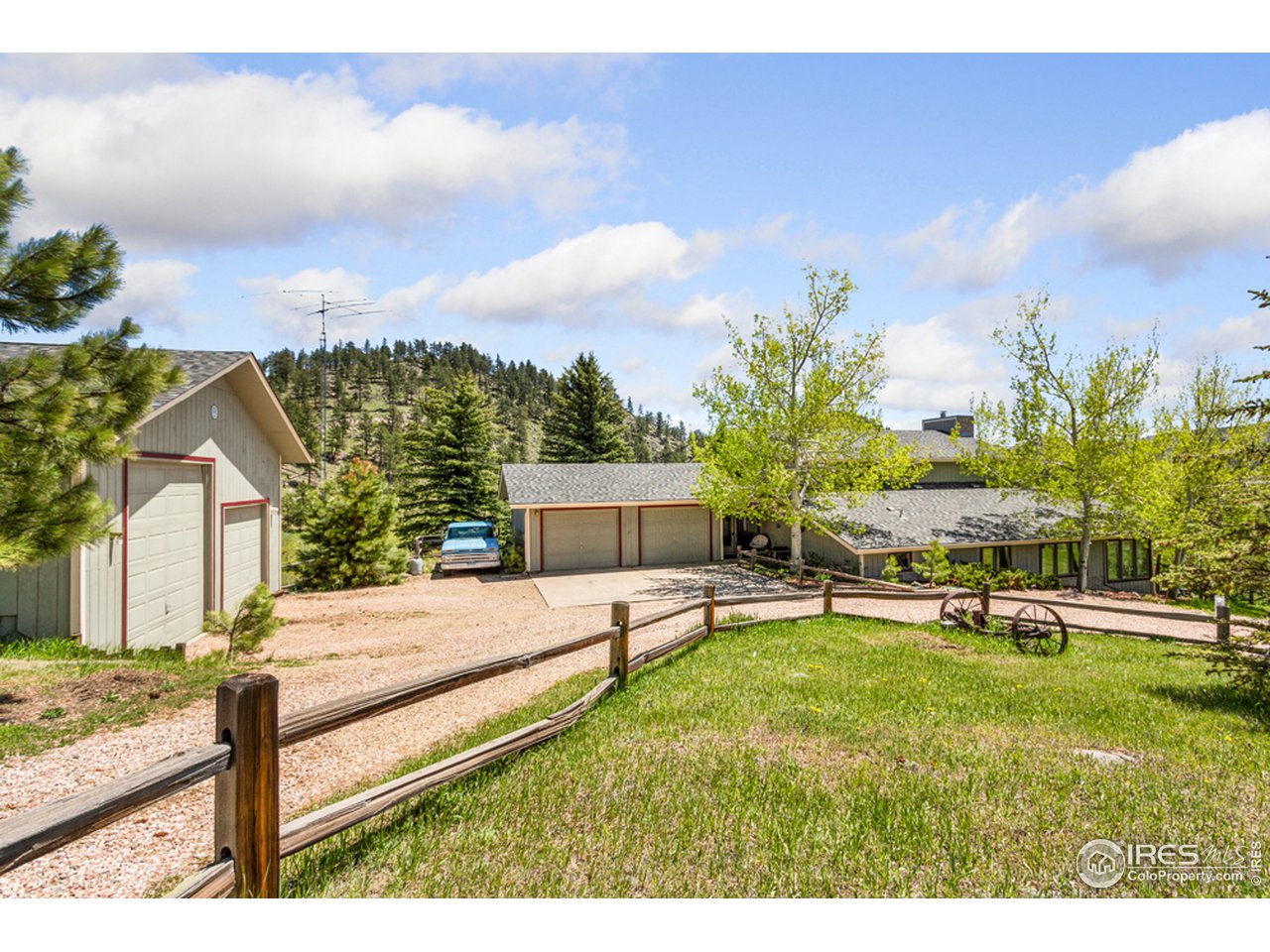 11900 Rist Canyon Road Bellvue, CO 80512 - Photo 2 of 34 a house view with a garden space