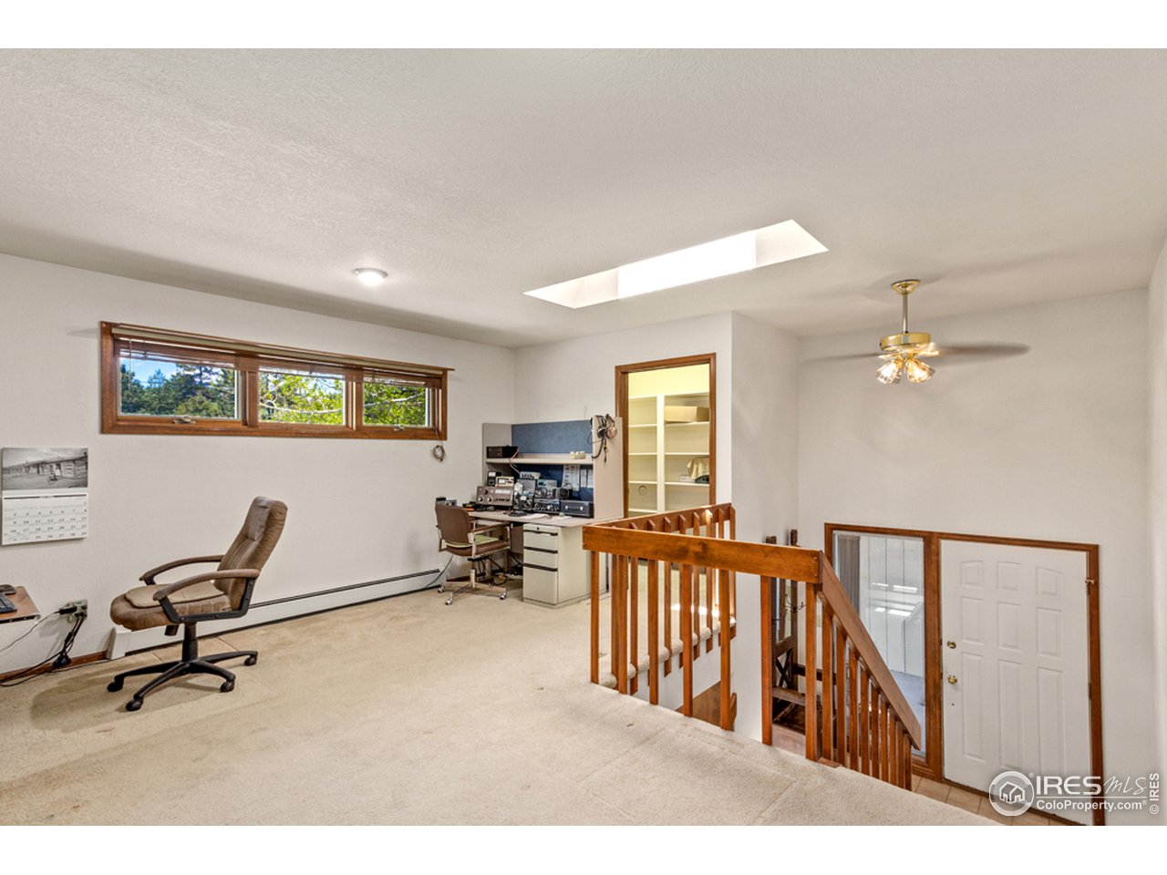 11900 Rist Canyon Road Bellvue, CO 80512 - Photo 20 of 34 a living room with furniture and a window